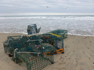 A bundle of lobster traps washed up in a winter storm.
